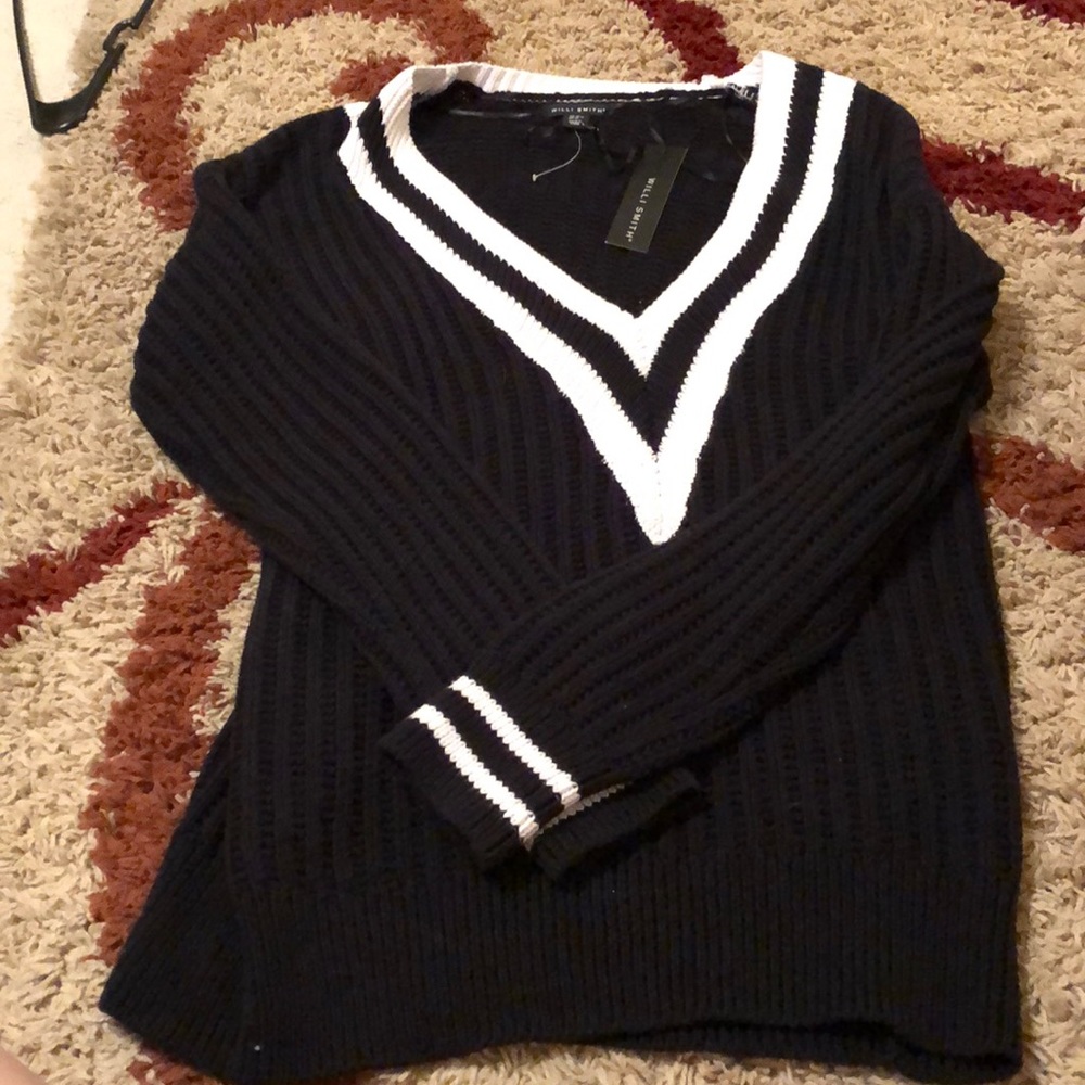 Long deep vneck sweater.
